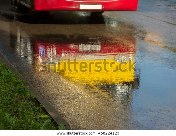 Wet road in\
rain.