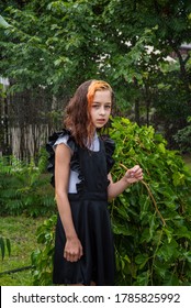 Wet Schoolgirl Standing In The Rain. Girl Wet. Teenager In School Uniform In Spring Or Warm Autumn. Girl 5th Grade. Hair Coloring. Portrait Of A Schoolgirl With Splashes Of Water. Back To School