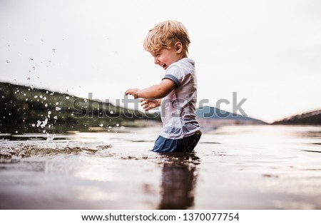 Similar – Feet standing on stone spiral staircase