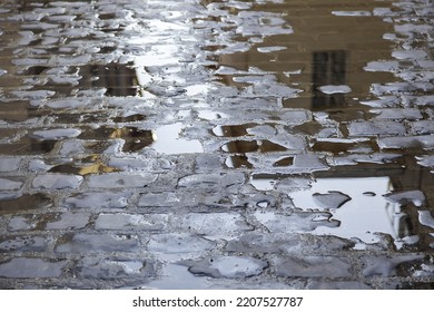 Wet stone street in old town, construction and architecture - Shutterstock ID 2207527787
