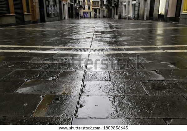 Wet\
street with rain, environment and storm,\
storms