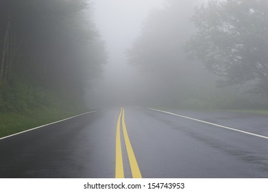 Wet Winding Road Disappearing Into Fog Stock Photo 154743953 | Shutterstock