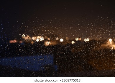 wet window in the city - Powered by Shutterstock