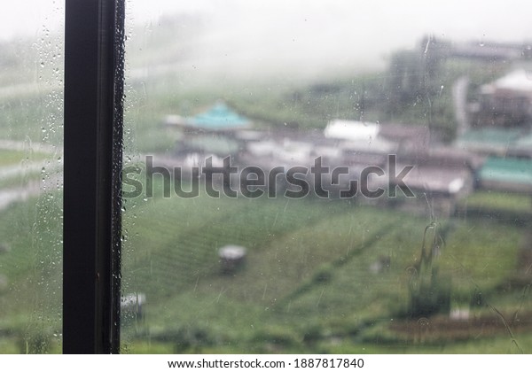 wet window glass from\
rain