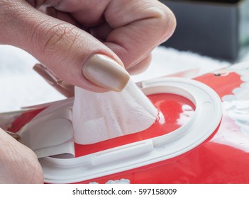 Wet Wipes In A Woman's Hand.