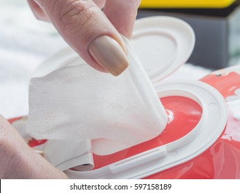 Wet Wipes In A Woman's Hand.