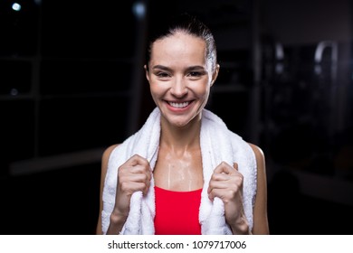 Wet Young Woman With White Towel On Her Shoulders Enjoying Refreshment After Hard Workout