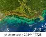 Wetland Damage Along the Gulf Coast. This photolike image of the Texas and Louisiana coasts shows the impact of Hurricane Ikes powerful storm. Elements of this image furnished by NASA.