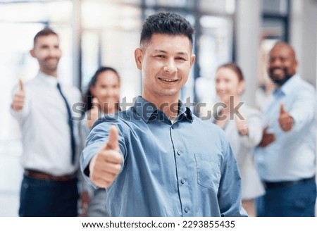 Weve got everything you need. Shot of a group of businesspeople showing a thumbs up in an office at work.