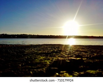 Wexford Sunset On Cobbles By The Slaney River