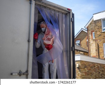 Weybridge. UK. May The 26th 2020. Photo Of Delivery Man Supplying  Meat During The Lockdown.