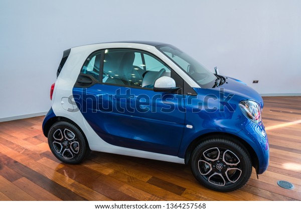 Weybridge,UK-April 4, 2019: Smart fortwo.It is a\
rear-engine, rear-wheel-drive, 2-seater manufactured by Mercedes\
Benz, Daimler\
comapny
