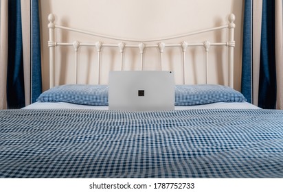 WFH - Work from Home with Laptop on Bed 