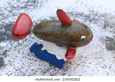 A Whale Made Of Painted Pebbles