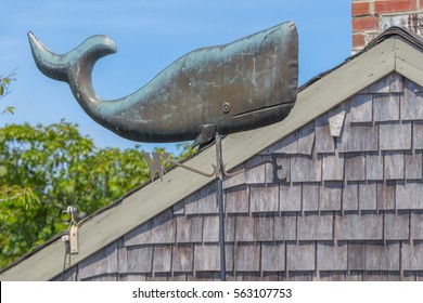 Whale Weather Vane - Copper Composition - On The Exterior Of A Home In Historic New England On Nantucket Island.  This Image Is Great To Promote B&B, Holiday And Vacation Tours And Travel.   