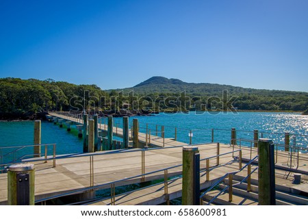 Wharf at Rangitoto Island, Hauraki Gulf, New Zealand in a sunny day