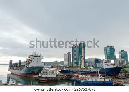 Wharf ship Port of Spain Trinidad waterfront skyscraper city captial outdoor sea capital commerical