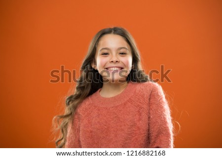 What is difference between phony and sincere smile. Girl cute child happy smiling face. What science has to say about genuine and fake smiles. Child long hair happy smiling. Happy childhood concept.