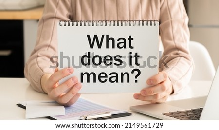What Does It Means Question text card, concept background.