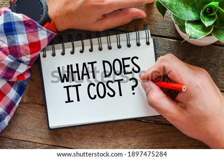 What does it cost? text written in the notebook.