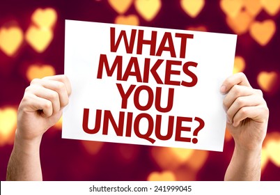 What Makes You Unique? card with heart bokeh background