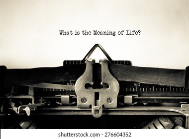 What Is The Meaning Of Life Message Typed On A Vintage Typewriter