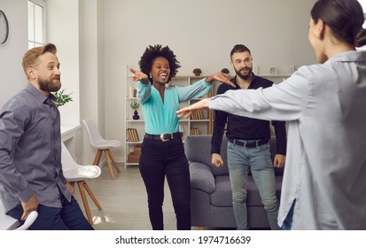 What A Nice Surprise. Come Here, My Girl. Two Young Women Excited To See Each Other. Happy Cheerful African American And Caucasian Female Friends Hug As They Meet At A Fun Reunion Party At Home