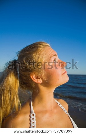 Portrait of a young woman on the beach