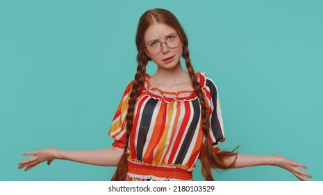 What Why. Sincere Irritated Redhead Girl Raising Hands In Indignant Expression Asking Reason Of Failure Demonstrating Disbelief Irritation By Troubles. Confused Teenager Child Kid On Blue Background