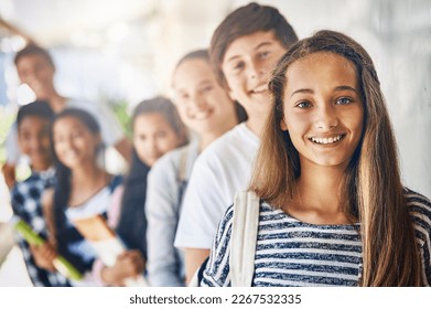 What will we learn today. Portrait of a group of happy schoolchildren standing in a line outside their classroom. - Powered by Shutterstock