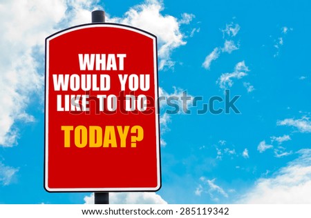 What Would You Like To Do Today? motivational quote written on red road sign isolated over clear blue sky background. Concept  image with available copy space