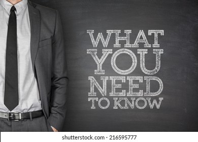 What you need to know on blackboard with businessman