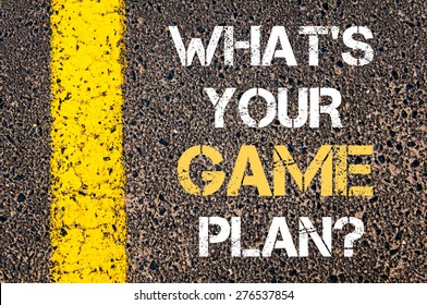  What Is Your Game Plan Motivational Quote. Yellow Paint Line On The Road Against Asphalt Background. Concept Image