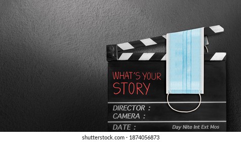 What's Your Story. Text Title And Surgical Mask On Film Slate. Storytelling Concept Of COVID-19,Coronavirus Movie.