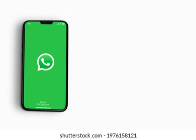 WhatsApp app on the smartphone screen on white background. Rio de Janeiro, RJ, Brazil. May 2021.