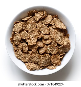 Wheat Bran Breakfast Cereal With No Milk In Ceramic Bowl. Isolated On White From Above.