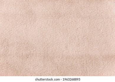 Wheat colour velour textile sample. Fabric texture background