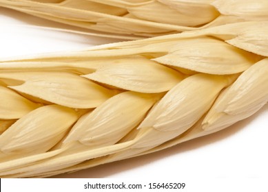 Wheat ears detail on white background