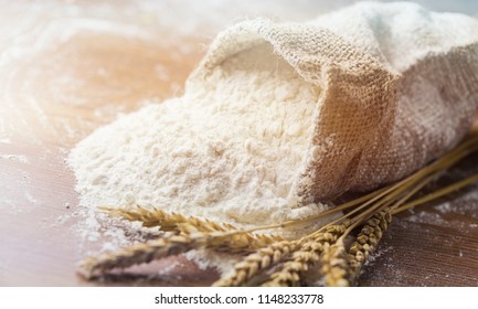 Wheat ears with egg and flour - Shutterstock ID 1148233778