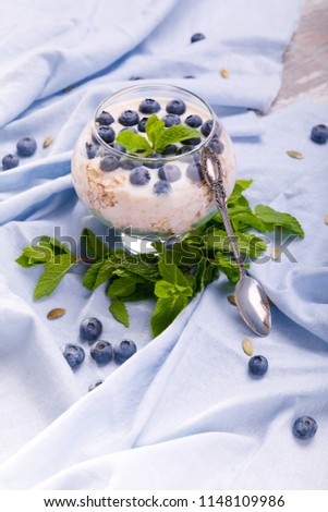 Wheat flakes with honey and blueberries
