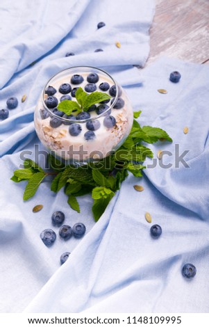Wheat flakes with honey and blueberries