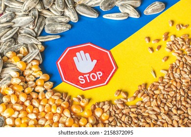 Wheat grains, corn and sunflower seeds on the yellow and blue flag of Ukraine with stop sign, Ukrainian grain crisis, global hunger crisis concept due to war - Powered by Shutterstock