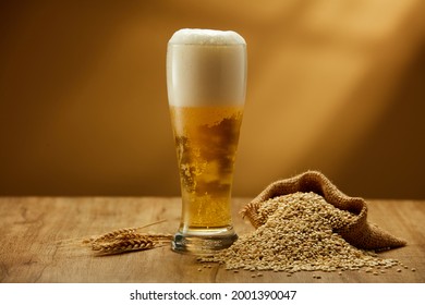 
Wheat Spikelets With One Mugs Of Beer On Empty Wooden Background

Still Life With A Draft Beer On Wooden Background