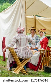 WHEATON, IL/USA - SEPT. 8, 2018: Three Women In Period Dress Enjoy A Chat Outside A Tent In A Military Encampment At A Reenactment Of The American Revolutionary War (1775-1783) At Cantigny Park.