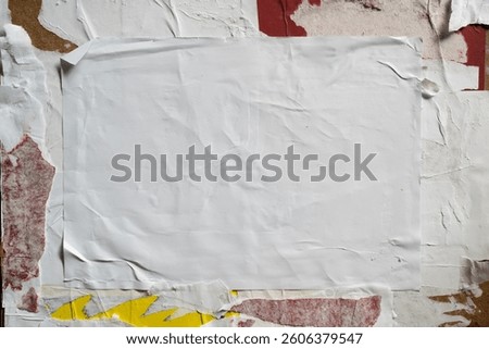 Wheatpaste poster style texture on a dirty wall