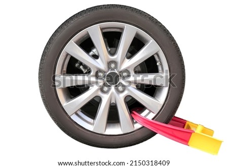 the wheel of the car is blocked for violating the rules. punishment. police. fine. is isolated on a white background.