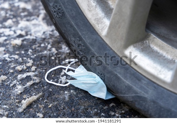 the wheel of the car ran over the protective
mask, the concept of the end of
the