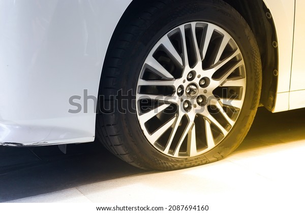 wheel of car tire leak\
from puncture