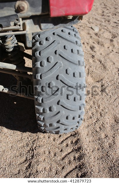 Wheel car tire and print on sand dune in the\
desert, Egypt