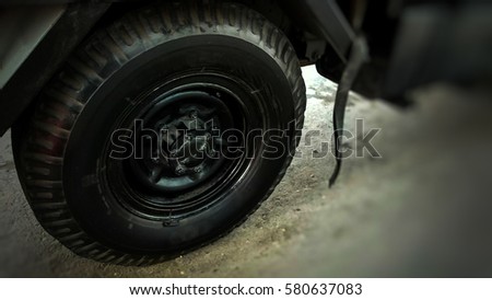 wheel car,tire.blurred background.